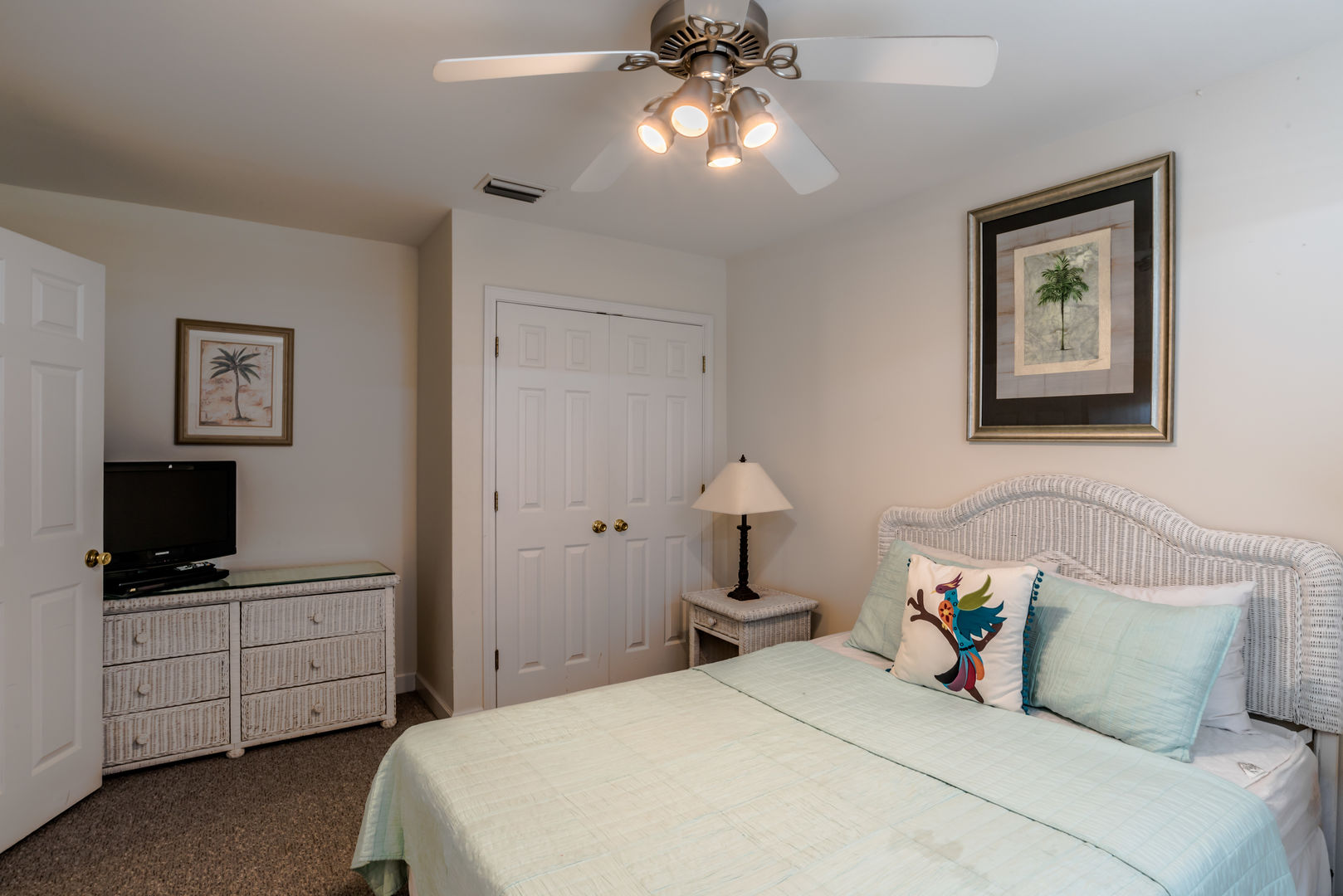 bedroom with king size bed located in one of our Gulf Shores Alabama vacation rentals