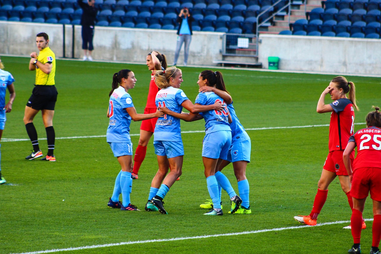 Soccer players celebrating a win at a NAIA soccer game